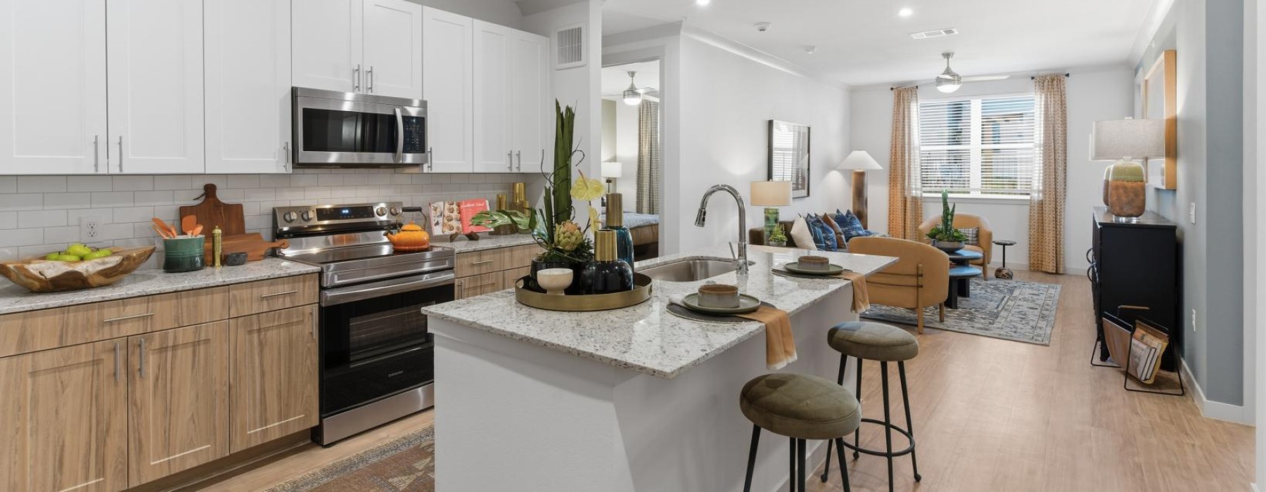 a kitchen with a marble island