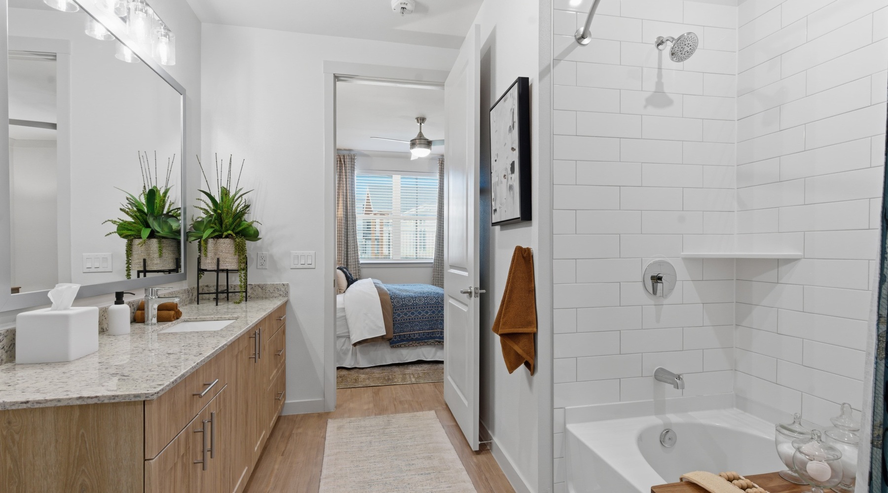 bath area leading into a bedroom